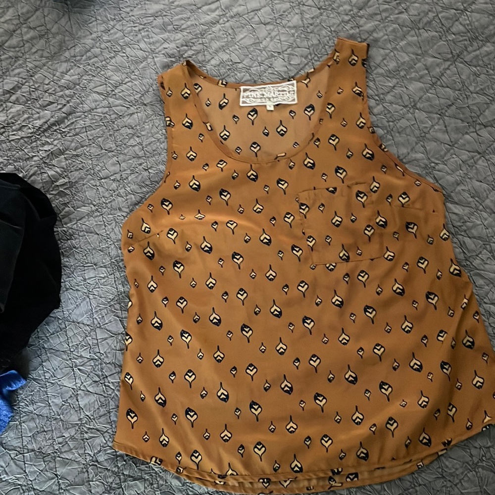 Pink martini camisole  small looks silk but poly. camel color. great with navy